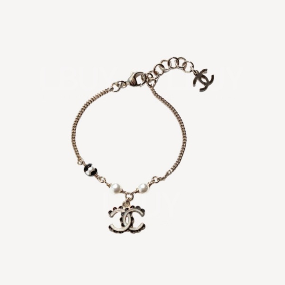 CHANEL Gold Bracelet with Pearl and Black Accents